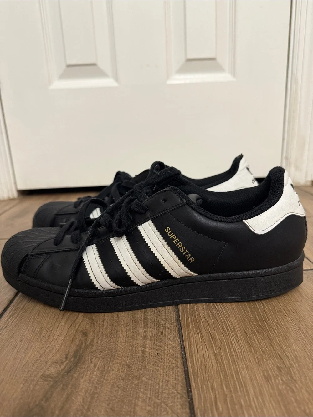 Adidas Superstar ADV Black Sneakers With Signature Stripes